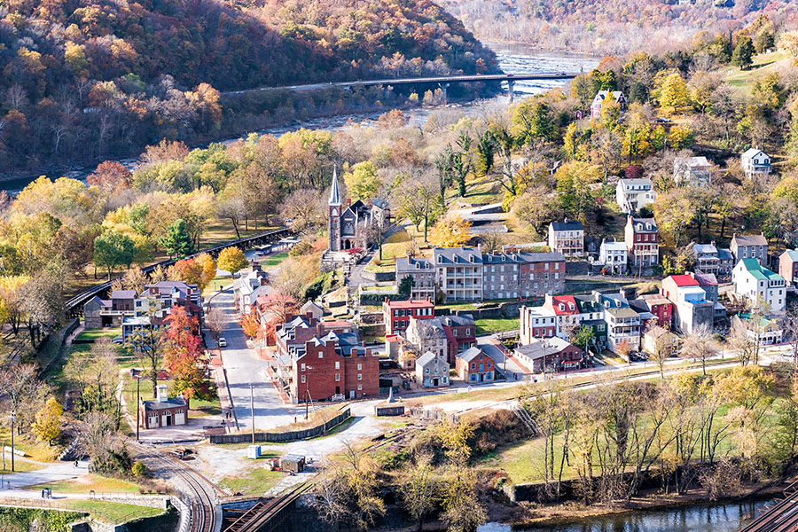 Providence Forge, VA - Closeup of Cityscape with Colorful Foliage of an Autumn Forest with Small Village Town in Virginia